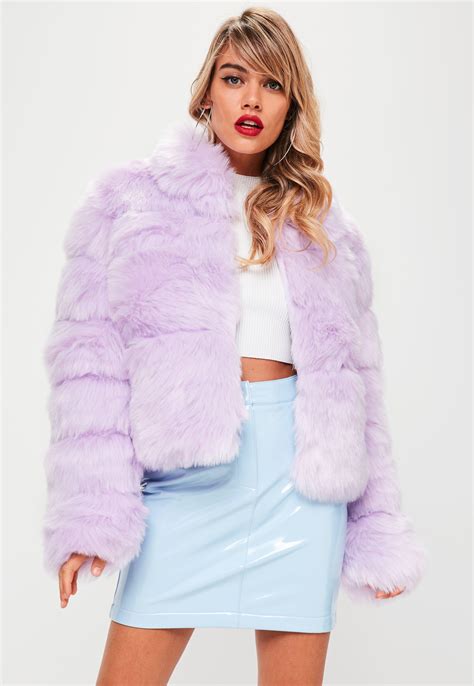 Rihanna’s Headpiece, Crop Top & Purple Fur Coat 